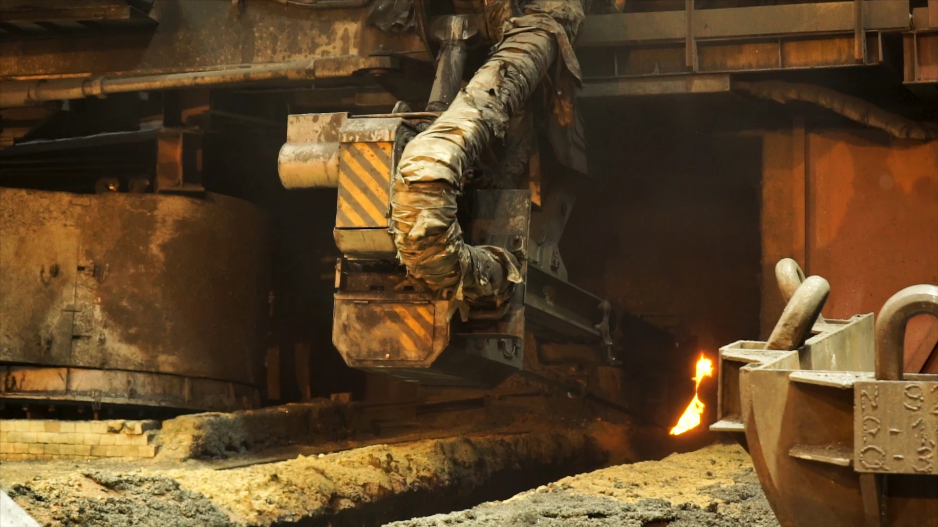 Metallurgical Coke Supplier – metallurgical installation with an industrial furnace and a coke feeding system in the metallurgical process.