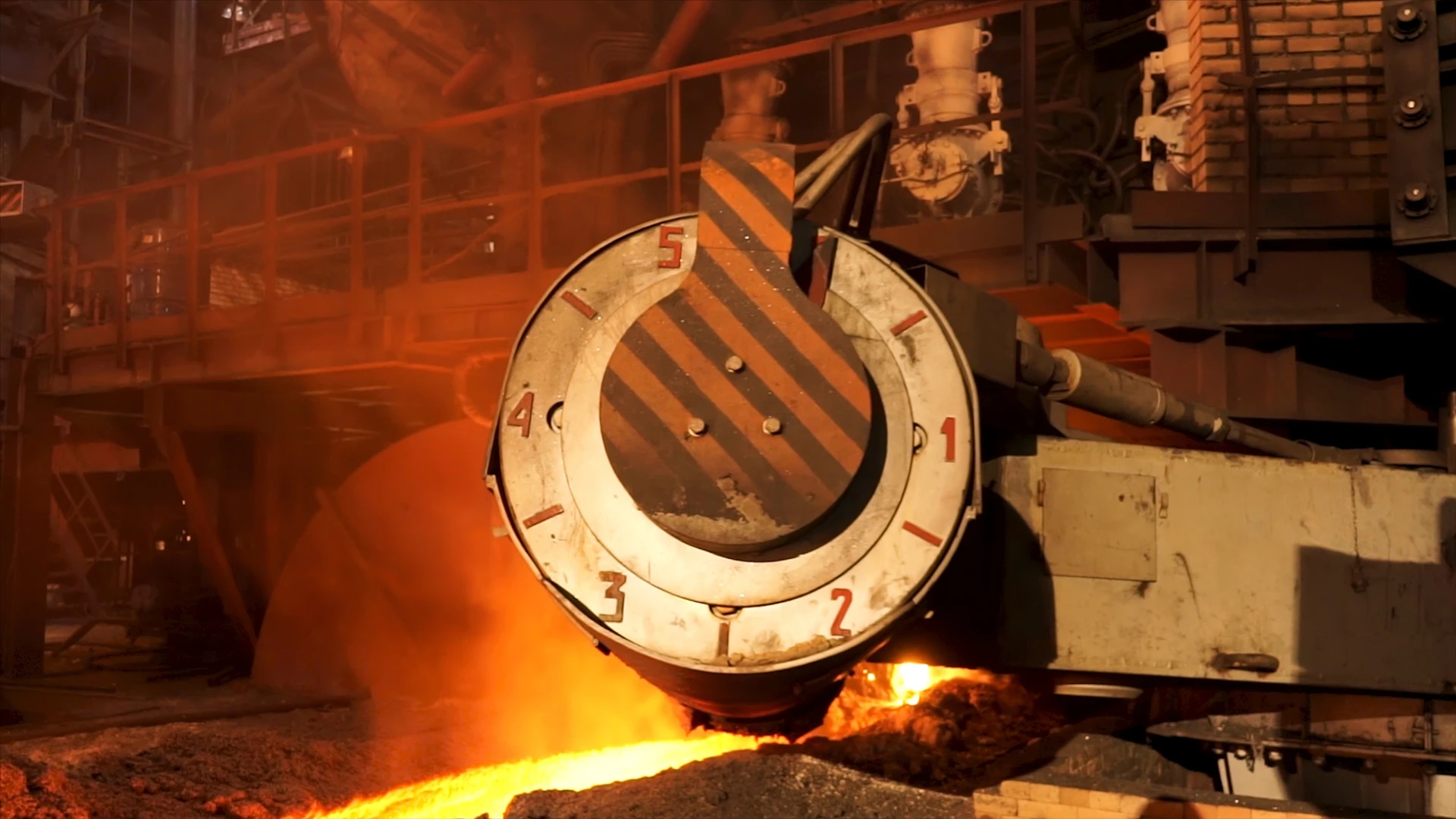 Metallurgical Coke Supplier – molten metal tapping process in a steel plant using metallurgical coke in steel production.